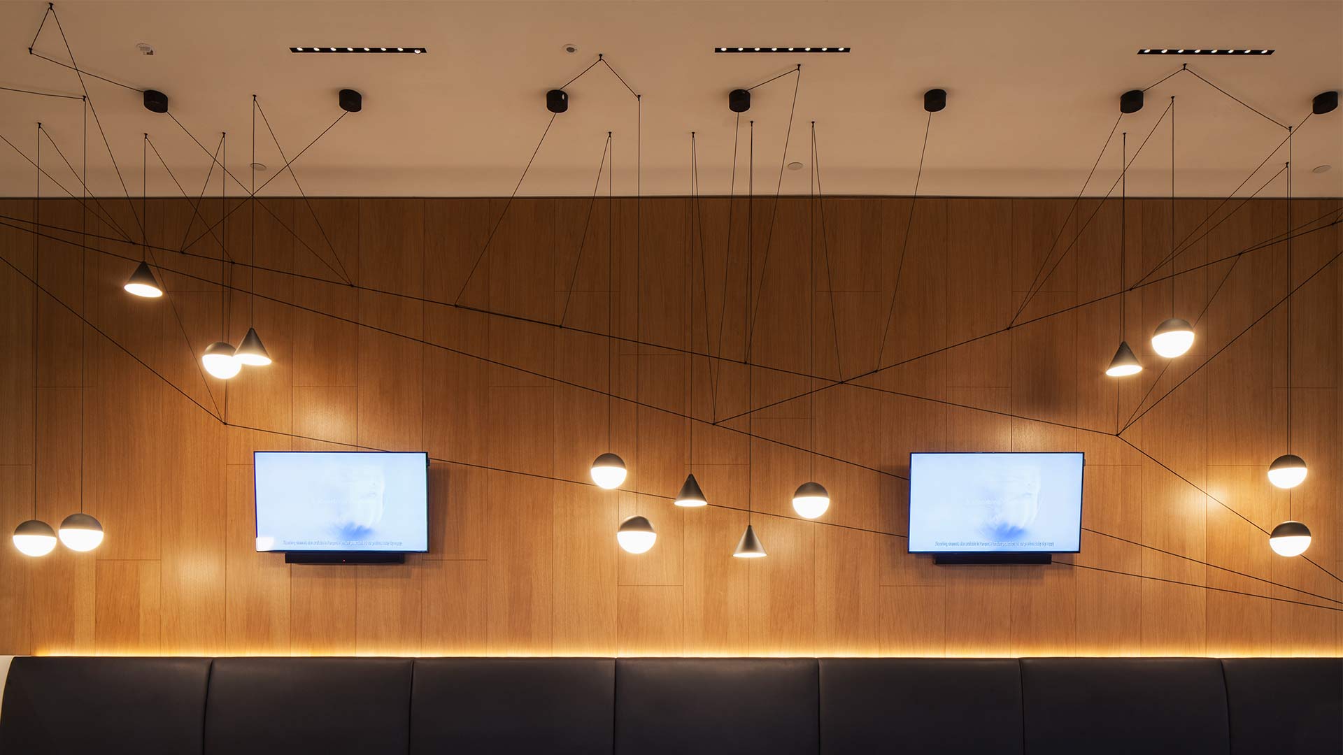 Suspended Pendants Pinned Cables Bench Seating Wood Wall Lighting Design Nulty