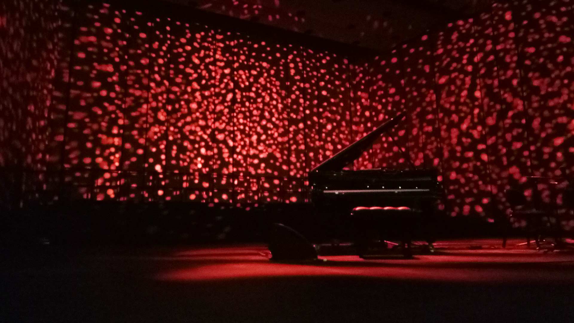 Scattered Red Light Piano Stage Dubai Opera