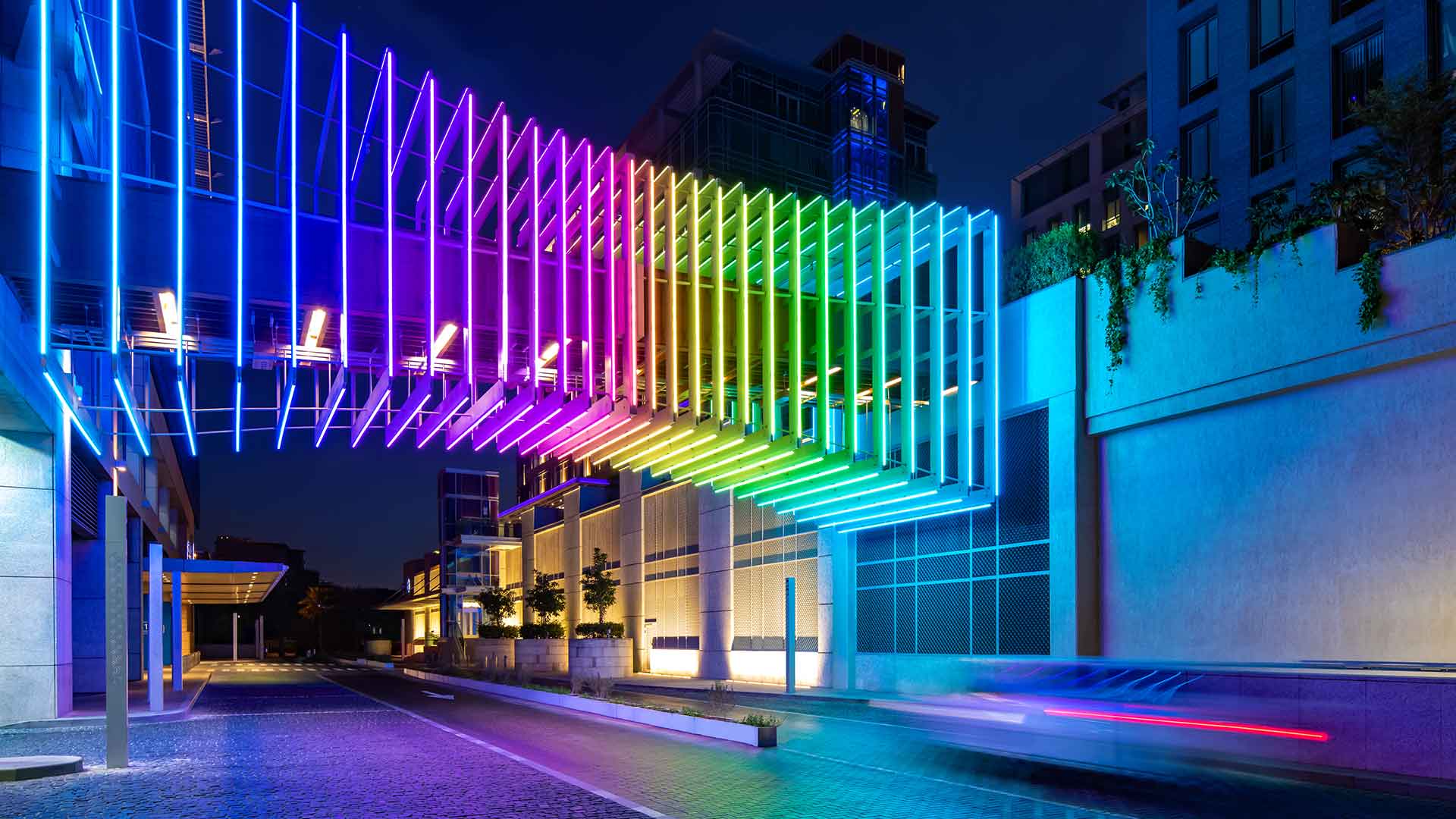 Illuminated Colour Changing Bridge Walkway Dynamic Light Installation DIFC Gate Village Dubai Consultants Nulty