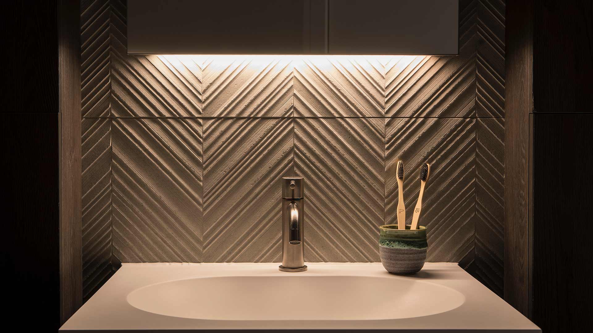 Bathroom Lighting Design Sink Unit Illuminated Textured Tiles Designers Nulty