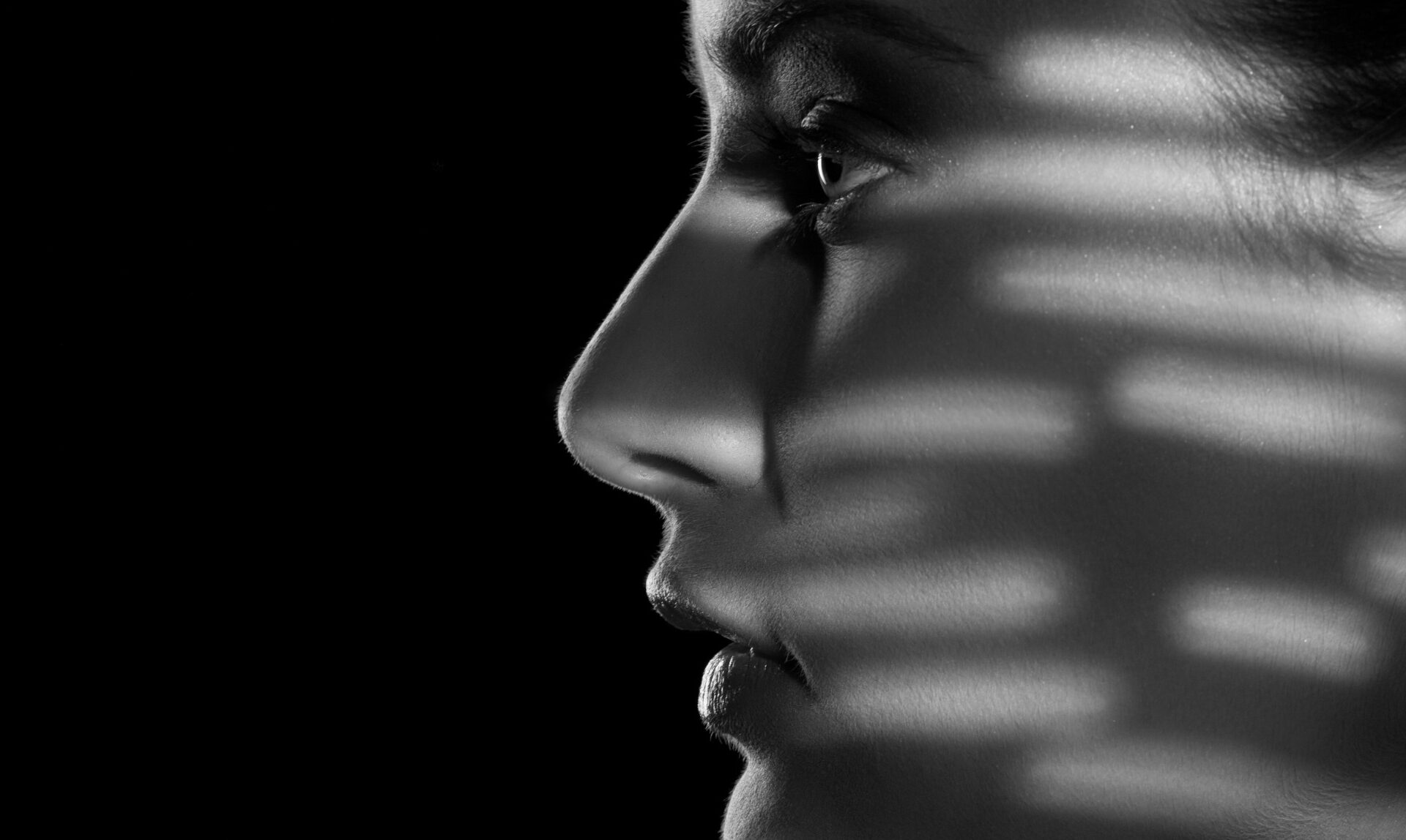 Shadows on womans face