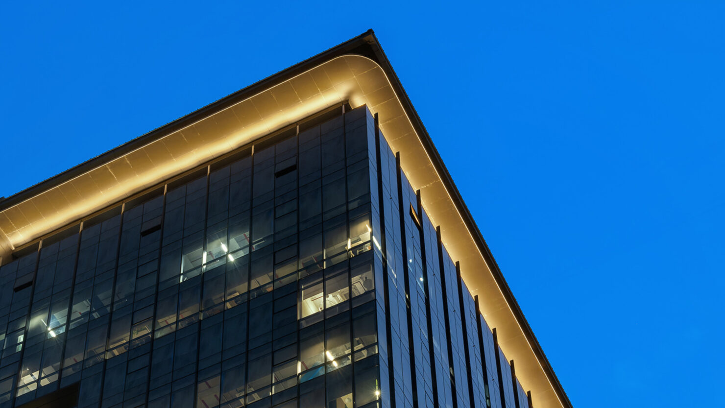 Panchshil avenue exterior lighting crown building’s crown is curved with a softly illuminated perimeter, 